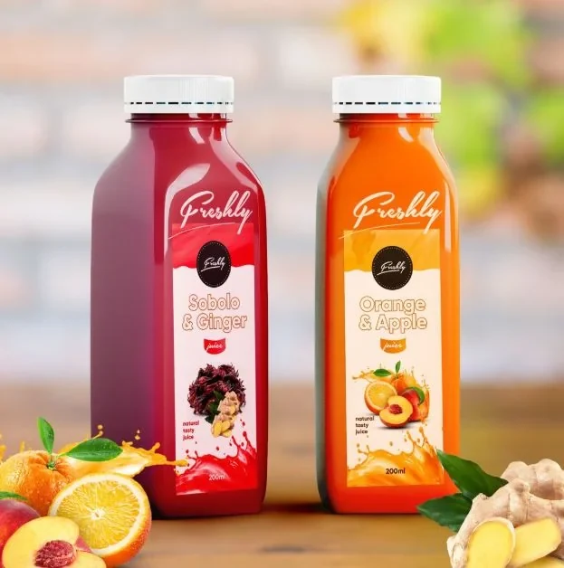 Freshly Sobolo and Ginger and Orange and Apple juice bottles