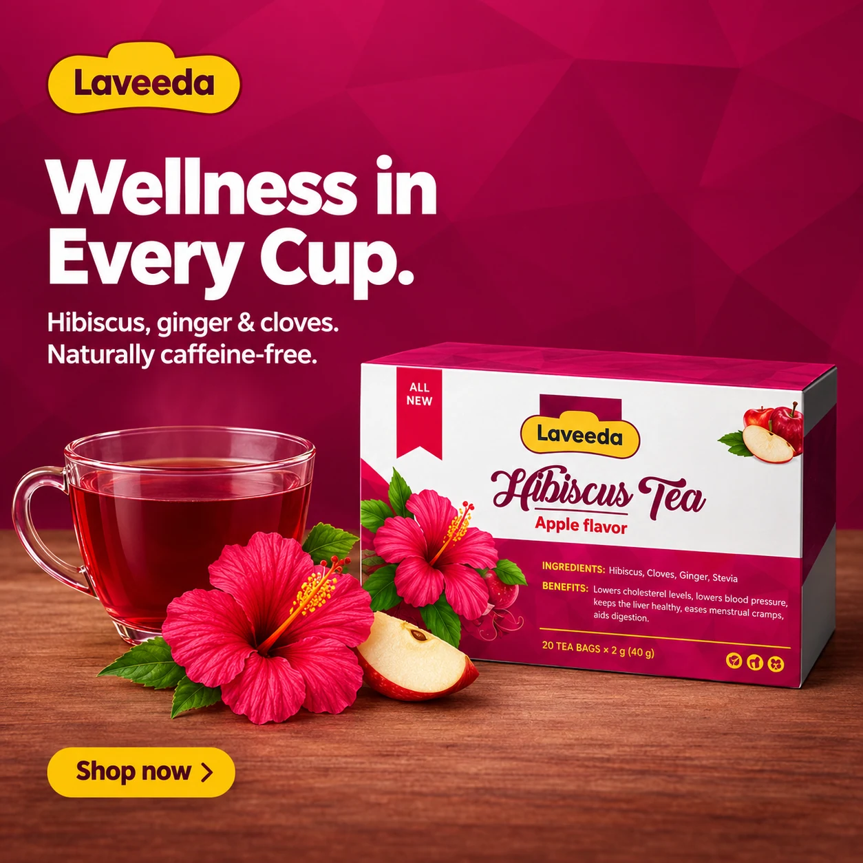 Laveeda social ad: Wellness in Every Cup, with the hibiscus tea box beside a glass cup of ruby-red tea, a hibiscus flower and apple slice