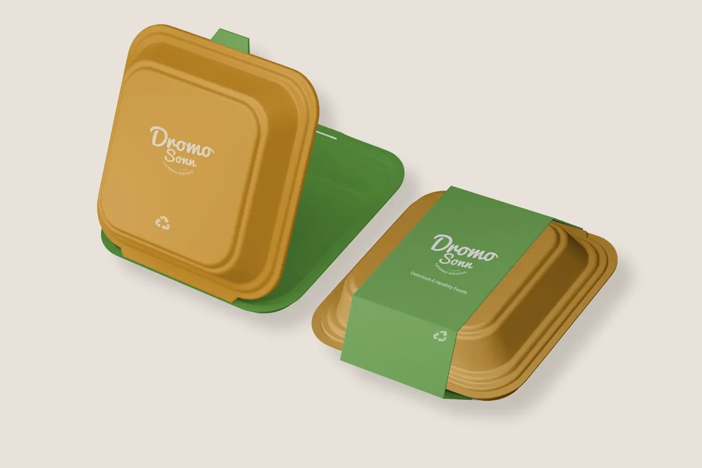 Two Dromo Sonn takeaway containers in gold and green